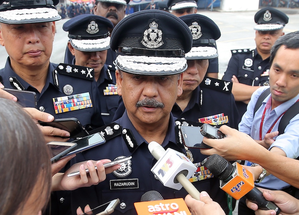 Perak police chief Datuk Razarudin Husain speaks to reporters at the state police headquarters in Ipoh August 7, 2019. u00e2u20acu201d Picture by Farhan Najib