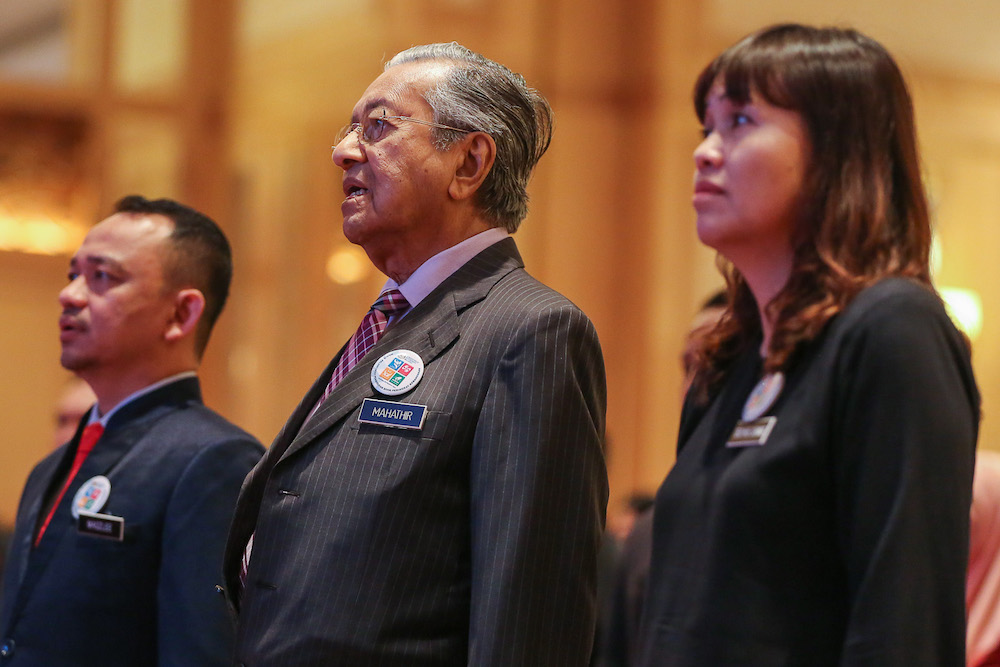 Education Minister Maszlee Malik, Prime Minister Tun Dr Mahathir Mohamad and Deputy Education Minister Teo Nie Ching attend the national civics education launch in Putrajaya August 13, 2019. u00e2u20acu201d Picture by Yusof Mat Isa