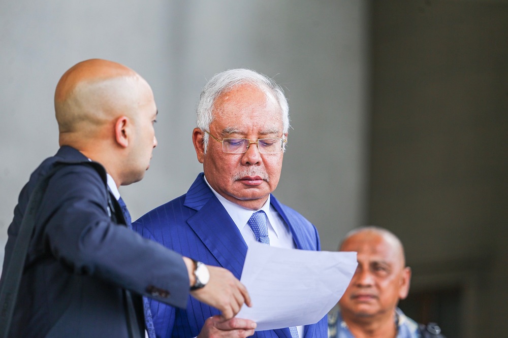 Datuk Seri Najib Razak leaves the Kuala Lumpur Court Complex August 13, 2019. u00e2u20acu201d Picture by Hari Anggara