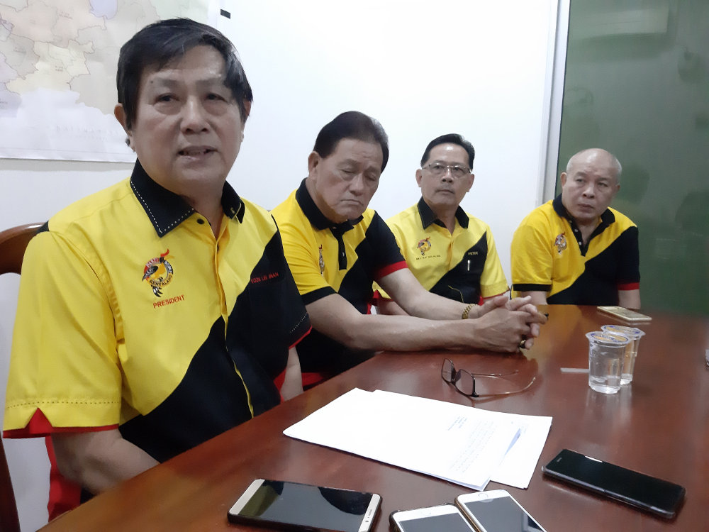 PBK president Voon Lee Shan (left) speaks to reporters during a press conference August 21, 2019. u00e2u20acu201d Picture by Sulok Tawie  