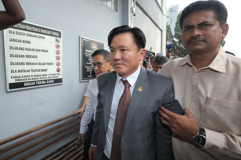 Perak state executive councillor Paul Yong walks to the Sessions Court in Ipoh where he is expected to be charged with rape on August 23, 2019. u00e2u20acu201d Picture by Farhan Najib