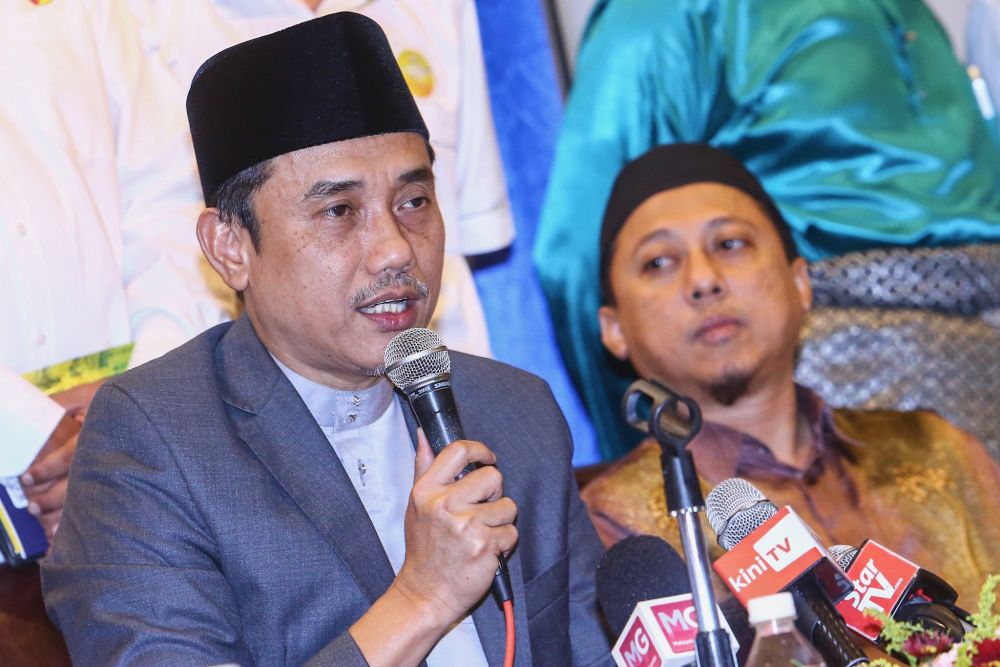 Gerakan Pembela Ummah chairman Aminuddin Yahya speaks to reporters during a press conference at the Kuala Lumpur International Hotel August 25, 2019. u00e2u20acu201d Picture by Hari Anggara