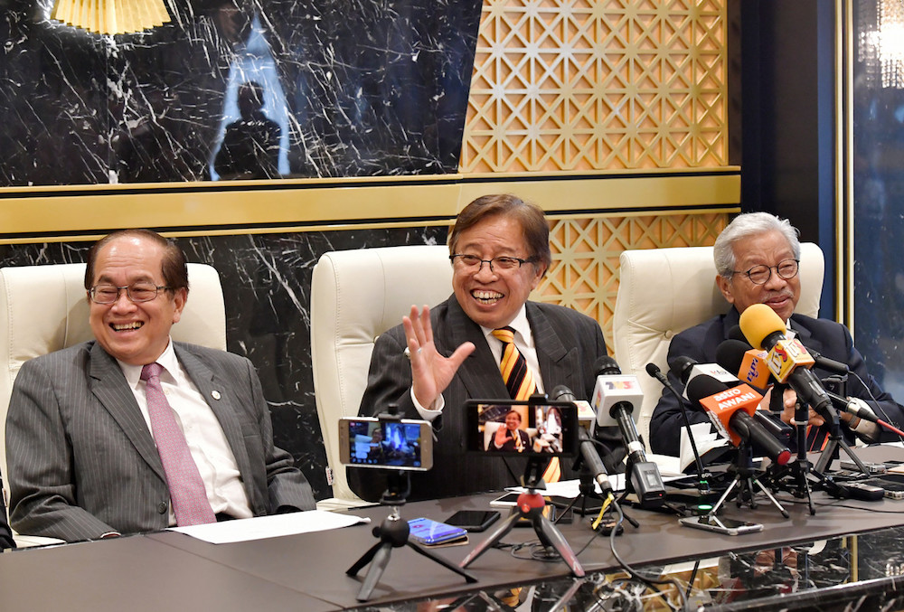 Datuk Amar Douglas Uggah Embas, Sarawak Chief Minister Datuk Patinggi Abang Johari Openg and Tan Sri James Masing address a press conference in Kuching August 22, 2019. u00e2u20acu201d Bernama pic