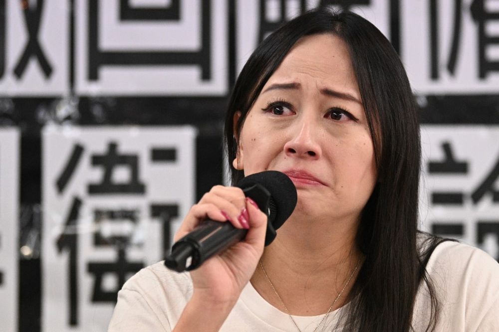 Hong Kong Dragon Airlines Flight Attendants Association chairperson Rebecca Sy, who was dismissed from her position as flight attendant for Cathay Pacificu00e2u20acu2122s subsidiary Cathay Dragon, reacts during a press conference in Hong Kong, August 23, 2019.u00e2u20acu201d AFP