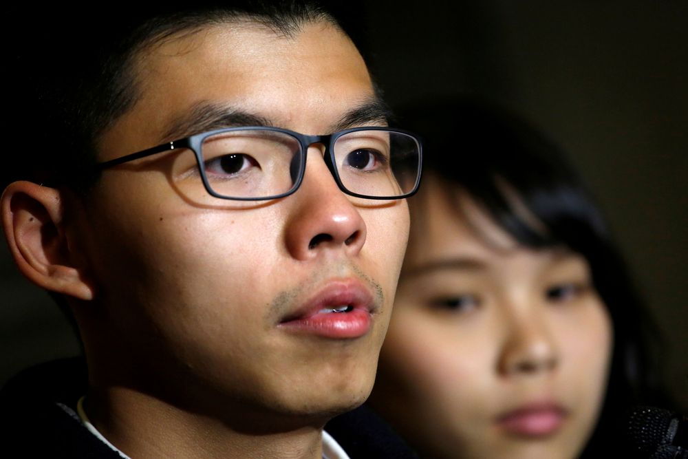 Former student leader Joshua Wong stands beside student activist Agnes Chow after being released on bail at the High Court in Hong Kong, China, January 23, 2018. u00e2u20acu201d Reuters pic