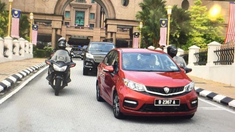 Tun Dr Mahathir Mohamad drove Indonesian President Joko Widodo to lunch in a red Proton Persona, August 9, 2019. u00e2u20acu2022 Picture via Twitter/bernamadotcom