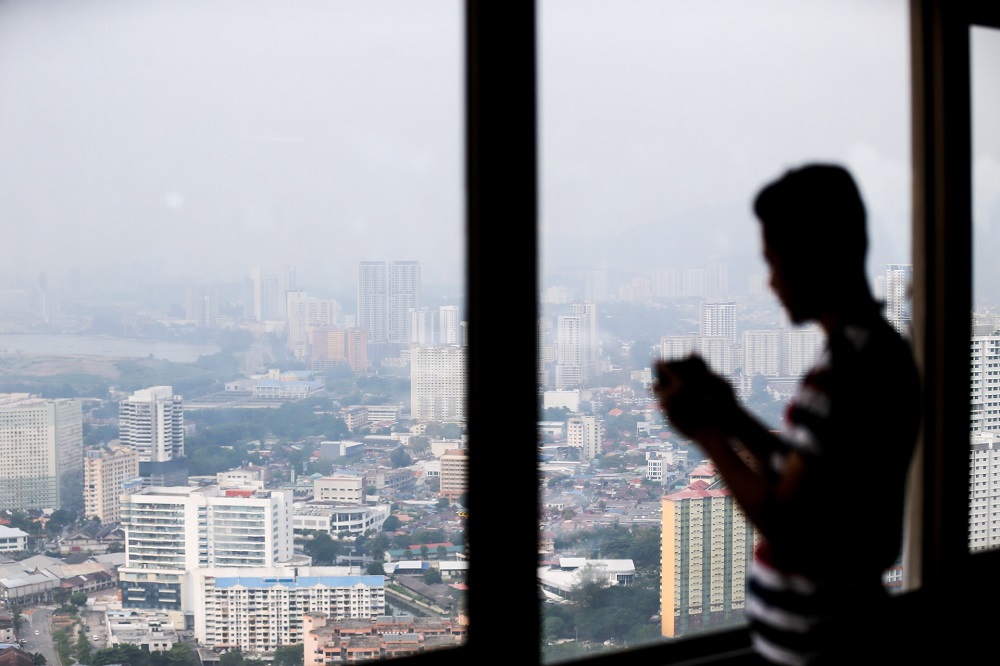 An aerial view of George Town on a hazy afternoon is seen from the Komtar building September 11, 2019. u00e2u20acu201d Picture by Sayuti Zainudin