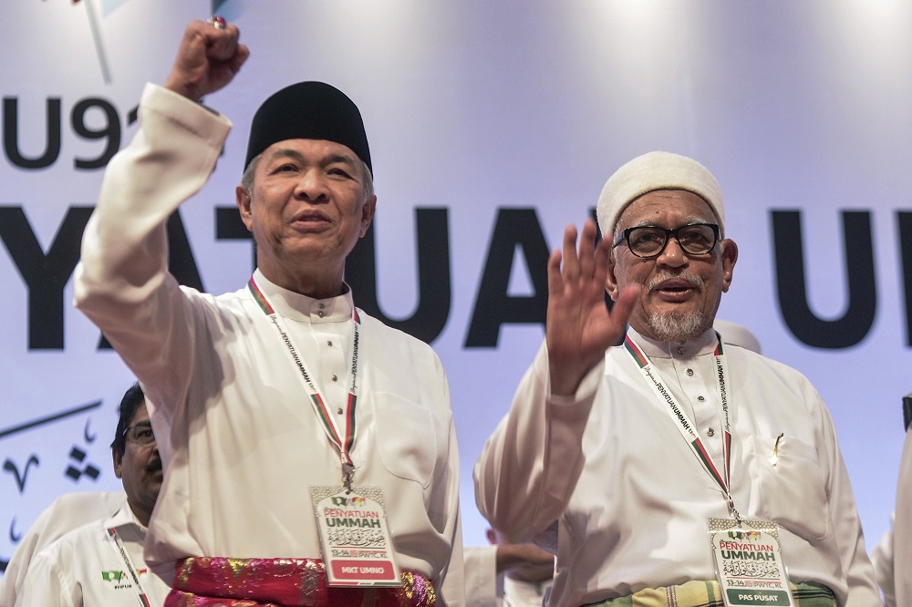 Umno president Datuk Seri Zahid Hamidi and PAS president Datuk Seri Hadi Awang at the Himpunan Penyatuan Ummah (Muslim Unity Rally) held at the Putra World Trade Centre in Kuala Lumpur September 14, 2019. u00e2u20acu201d Picture by Shafwan Zaidon