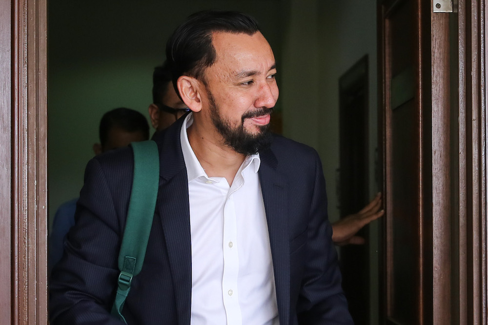 Datuk Amhari Efendi Nazaruddin leaves the courtroom during a break in the 1MDB trial at the Kuala Lumpur Courts Complex September 18, 2019. u00e2u20acu201d Picture by Yusof Mat Isa