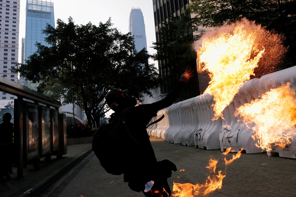An anti-government protester throws a Molotov cocktail during a demonstration near Central Government Complex in Hong Kong September 15, 2019. u00e2u20acu201d Reuters pic