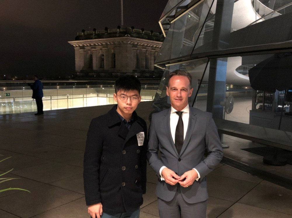 Hong Kong activist Joshua Wong poses with German Foreign Minister Heiko Maas on top of the Bundestag, Germanyu00e2u20acu2122s parliament building in Berlin, September 9, 2019 in this picture obtained from social media. u00e2u20acu201d Joshua Wong pic via Reuters 