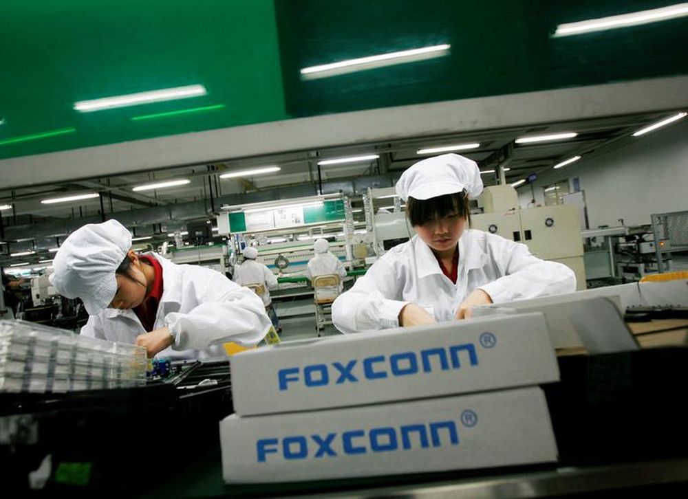 Employees work inside a Foxconn factory in the township of Longhua in the southern Guangdong province, China, May 26, 2010. u00e2u20acu201d Reuters pic