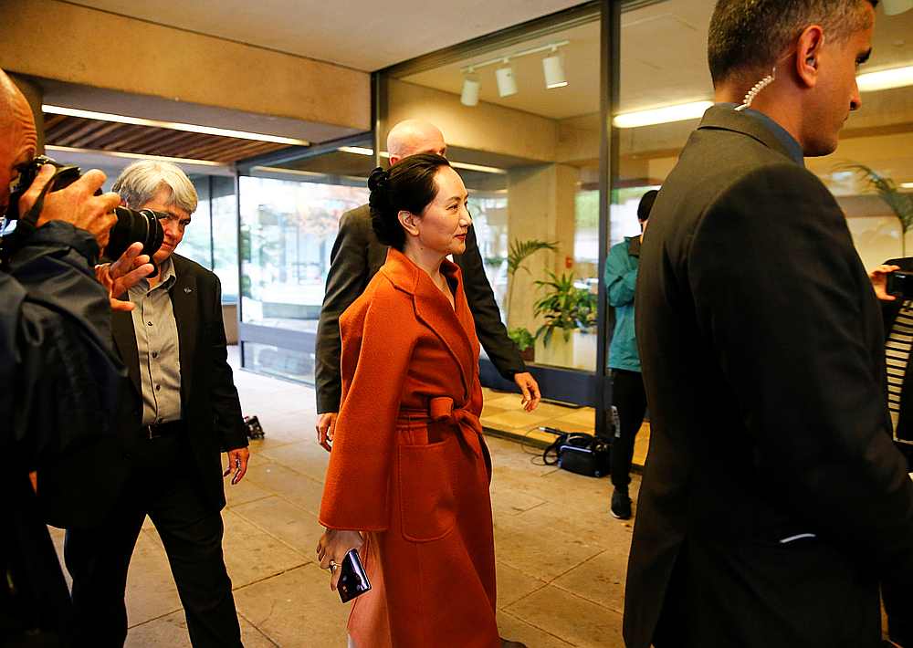 Huawei Technologies Chief Financial Officer Meng Wanzhou (centre) returns from a lunch break during a hearing at British Columbia supreme court in Vancouver, Canada September 23, 2019. u00e2u20acu201d Reuters pic 
