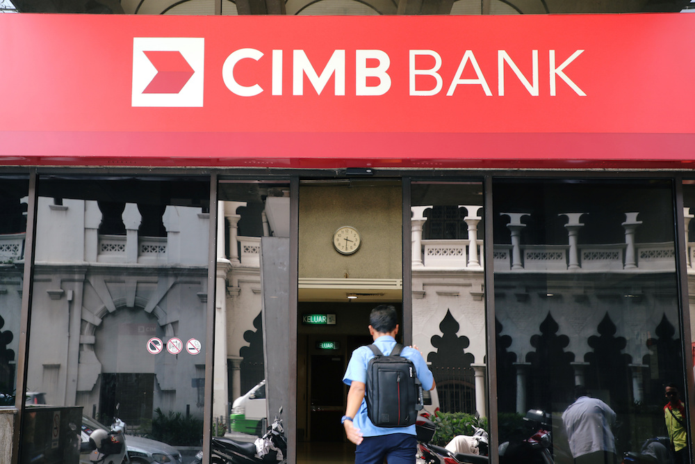 A man walks into a branch of CIMB bank in Kuala Lumpur August 6, 2019. u00e2u20acu201d Reuters pic