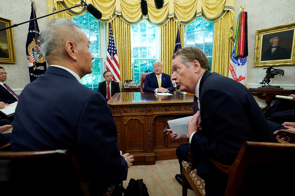 US Trade Representative Robert Lighthizer speaks with China's Vice Premier Liu He during a meeting with US President Donald Trump in the Oval Office at the White House after two days of trade negotiations in Washington October 11, 2019. u00e2u20acu201d Reuters pic