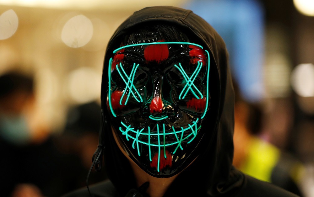 An anti-government protester wears a mask during a demonstration at New Town Plaza shopping mall in Hong Kong October 12, 2019. u00e2u20acu201d Reuters pic