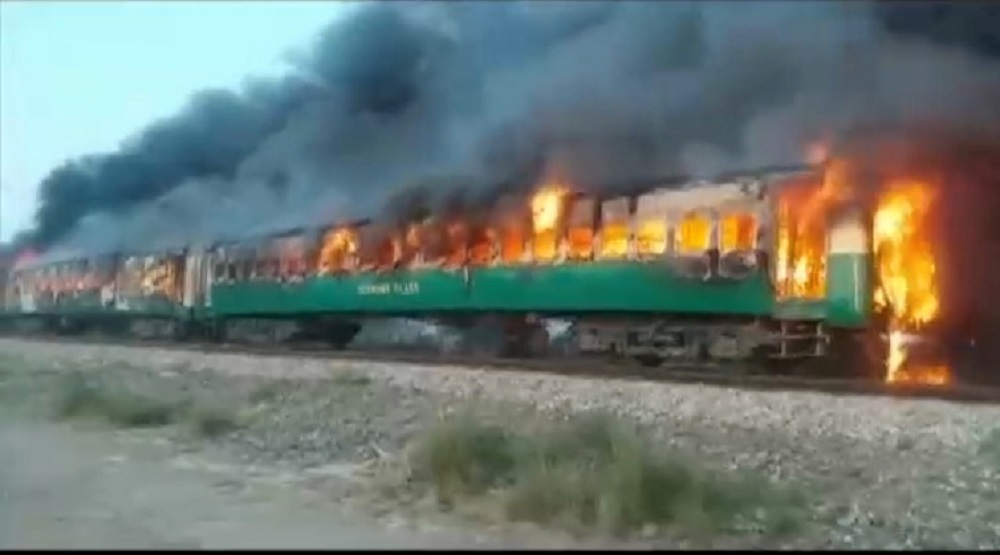 A fire burns a train carriage after a gas canister passengers were using to cook breakfast exploded, near the town of Rahim Yar Khan in the south of Punjab province, Pakistan October 31, 2019. u00e2u20acu201d Still image taken from video via Reuters