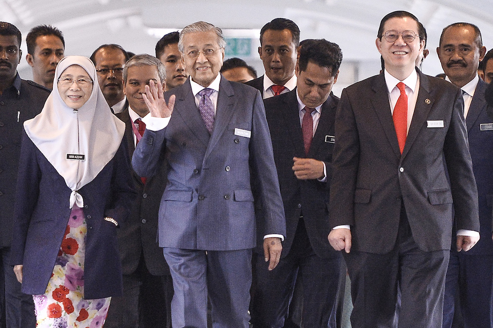 Prime Minster Tun Dr Mahathir Mohamad, Deputy Prime Minister Datuk Seri Dr Wan Azizah Wan Ismail and Finance Minister Lim Guan Eng arrive in Parliament for the tabling of Budget 2020 on October 11, 2019. u00e2u20acu201d Picture by Miera Zulyana