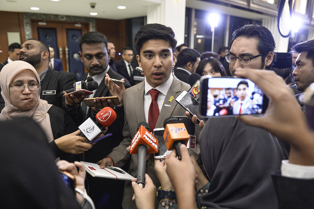 Syed Saddiq Abdul Rahman speaks to reporters in Parliament after the tabling of Budget 2020 on October 11, 2019. u00e2u20acu201d Picture by Miera Zulyana