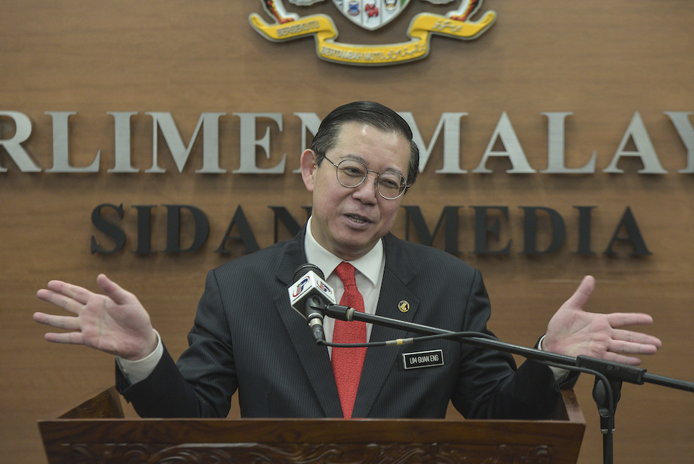 Finance Minister Lim Guan Eng speaks to reporters in Parliament October 11, 2019, after the tabling of Budget 2020. u00e2u20acu201d Picture by Shafwan Zaidon