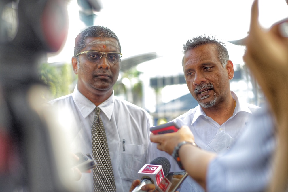 Lawyers/politicians RSN Rayer and Ramkarpal Singh speak to reporters outside Bukit Aman police headquarters in Kuala Lumpur October 14,2019. u00e2u20acu201d Picture by Ahmad Zamzahuri