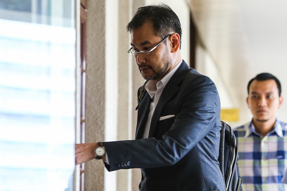 Former 1MDB chief executive officer Datuk Shahrol Azral Ibrahim Halmi arrives at the Kuala Lumpur High Courts Complex October 14, 2019. u00e2u20acu201d Picture by Yusof Mat Isa