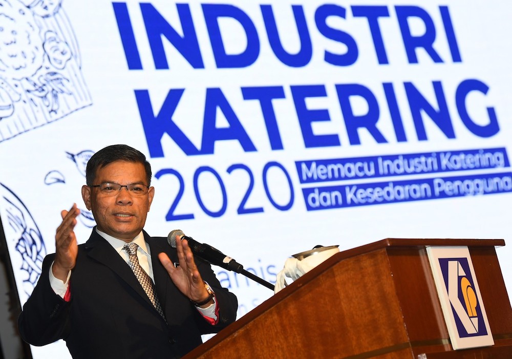 Domestic Trade and Consumer Affairs Minister Datuk Seri Saifuddin Nasution Ismail gives his opening address at the launch of the 2020 Catering Industry Action Plan in Putrajaya October 3, 2019. u00e2u20acu201d Bernama pic