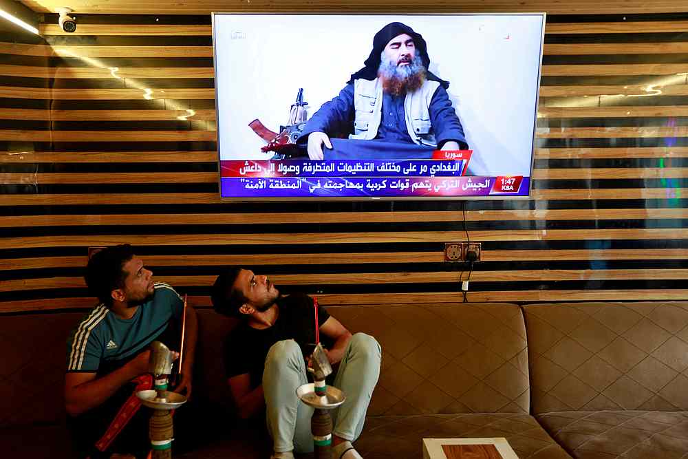 Iraqi youth watch the news of Islamic State leader Abu Bakr al-Baghdadi death, in Najaf, Iraq October 27, 2019. u00e2u20acu201d Reuters pic