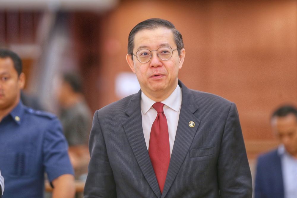 Finance Minister Lim Guan Eng is pictured at the Parliament lobby, October 15, 2019. u00e2u20acu2022 Picture by Ahmad Zamzahuri