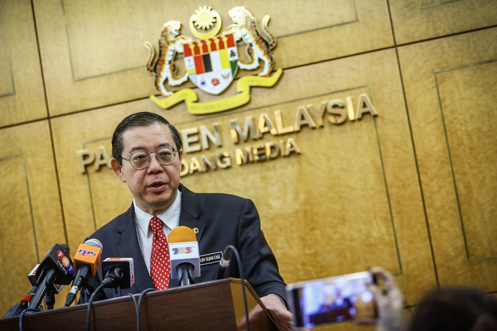 Finance Minister Lim Guan Eng speaks to reporters in the lobby of Parliament October 14, 2019. u00e2u20acu201d Picture by Hari Anggara