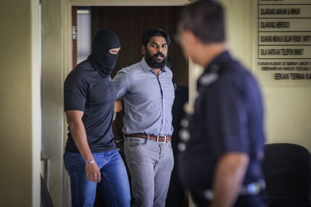 Suspected Liberation Tigers of Tamil Eelam sympathiser A. Kalaimughilan arrives at the Selayang Sessions Court October 29, 2019. u00e2u20acu201d Picture by Hari Anggara