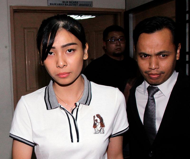 Sales promoter Sam Ke Ting (left), 24, was released by the Johor Bahru Magistrate Court October 28, 2019. She was cleared of reckless driving that lead to the death of eight teenage cyclists on January 18, 2017. u00e2u20acu201d Bernama pic