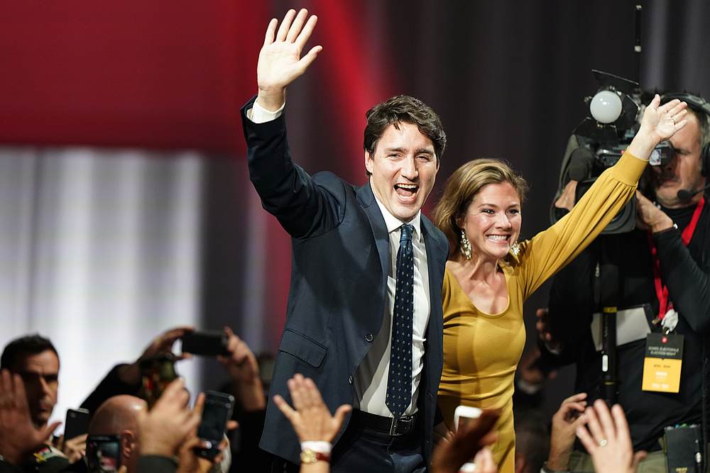 Liberal leader and Canadian Prime Minister Justin Trudeau and his wife Sophie Gregoire Trudeau wave to supporters after the federal election at the Palais des Congres in Montreal, Quebec October 22, 2019. u00e2u20acu201d Reuters pic