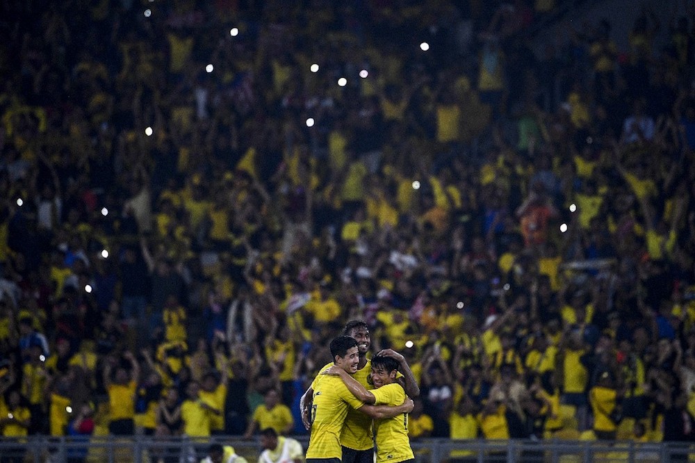 Malaysiau00e2u20acu2122s players celebrate after winning the Qatar 2022 Fifa World Cup qualifying match with Thailand at Bukit Jalil Stadium November 14, 2019. u00e2u20acu201d AFP pic