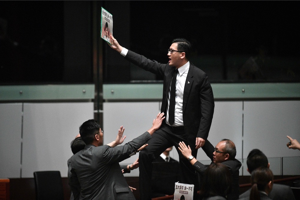 Pro-democracy lawmaker Lam Cheuk-ting stands up and protests at the Legislative Council in Hong Kong October 16, 2019. u00e2u20acu201d AFP pic
