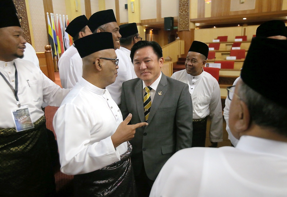 Perak DAP assemblyman Paul Yong banters with Opposition assemblymen at the State Legislative Assembly in the State Secretariat Building in Ipoh November 15, 2019. u00e2u20acu201d Picture by Farhan Najib