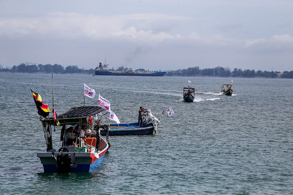 Fishing boats are seen during a protest against the proposed Penang South Reclamation project near Esplanade November 4, 2019. u00e2u20acu201d Picture by Sayuti Zainudin