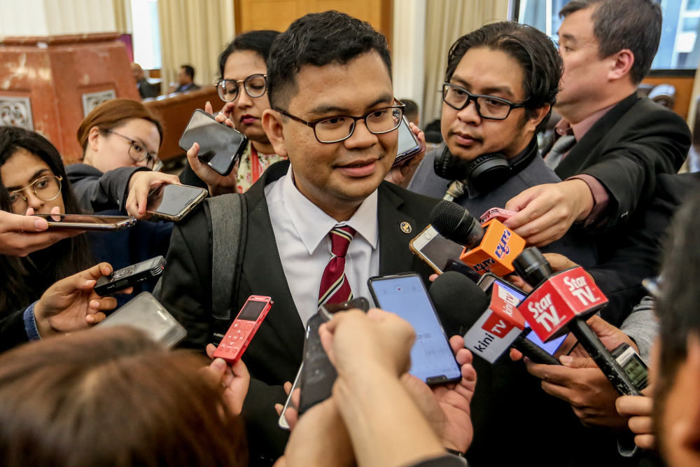 Johor Baru MP Akmal Nasrullah Mohd Nasir speaks to reporters at Parliament in Kuala Lumpur November 13, 2019. u00e2u20acu201d Picture by Firdaus Latif