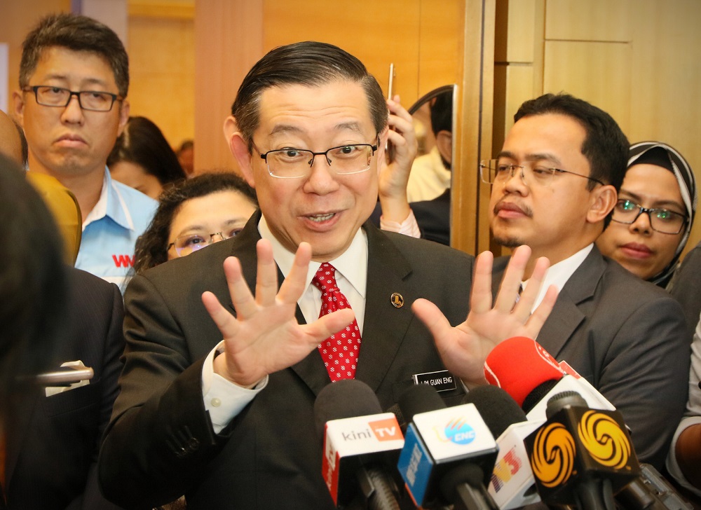 Finance Minister Lim Guan Eng speaks to reporters after the MoU signing ceremony between SME bank, MRL and CCC-ECRL in Kuala Lumpur November 18, 2019.