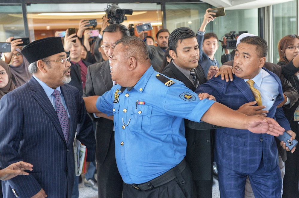 Pasir Salak MP Datuk Seri Tajuddin Abdul Rahman and Kuala Krau MP Datuk Seri Ismail Mohamed Said almost come to blows in Parliament November 20, 2019. u00e2u20acu201d Picture by Shafwan Zaidon