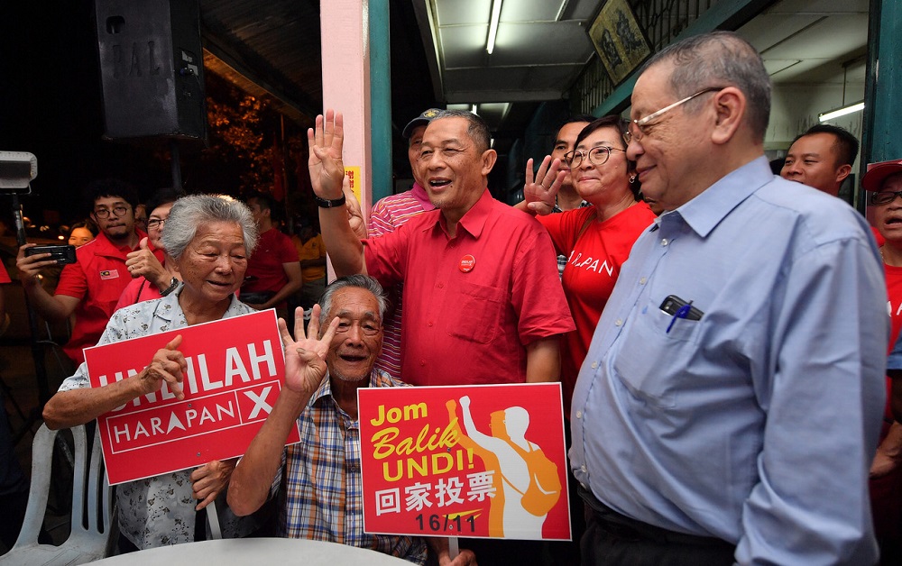 PHu00e2u20acu2122s candidate for the Tanjung Piai by-election Karmaine Sardini (centre) and DAPu00e2u20acu2122s Lim Kit Siang greeting some of the attendees at a forum in Kampung Penerok in Pontian November 6, 2019. u00e2u20acu201d Bernama pic