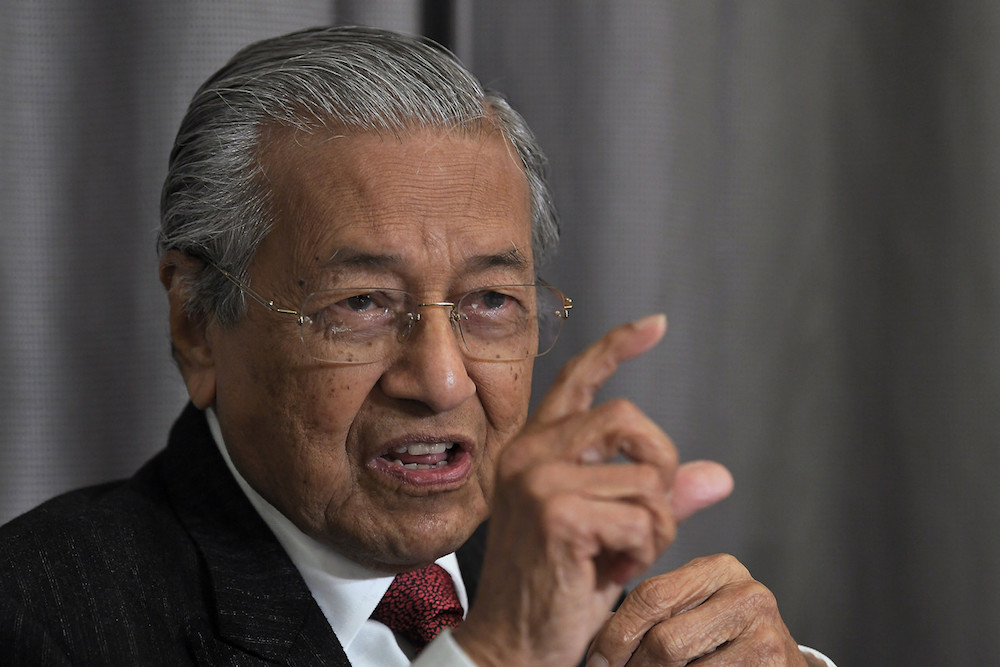 Prime Minister Tun Dr Mahathir Mohamad addresses a press conference in conjunction with the Asean-South Korea Commemorative Summit 2019 in Busan November 26, 2019. u00e2u20acu201d Bernama pic