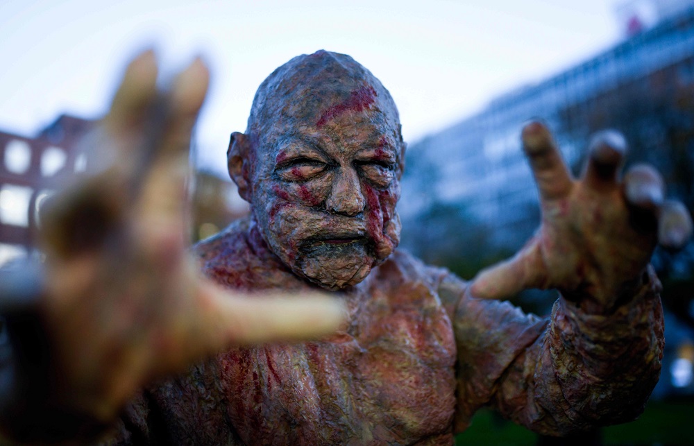 A participant in a Halloween zombie walk event poses in Essen, western Germany October 31, 2019. u00e2u20acu201d AFP pic