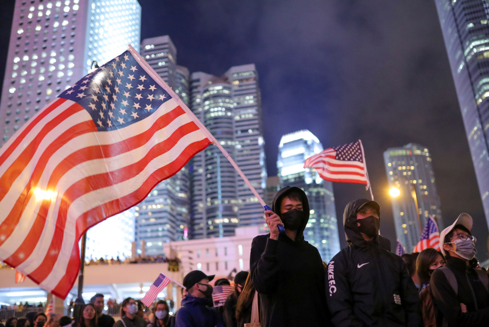 A protestor holds a US flag while he attends a gathering at the Edinburgh place in Hong Kong, China, November 28, 2019. u00e2u20acu201d Reuters pic