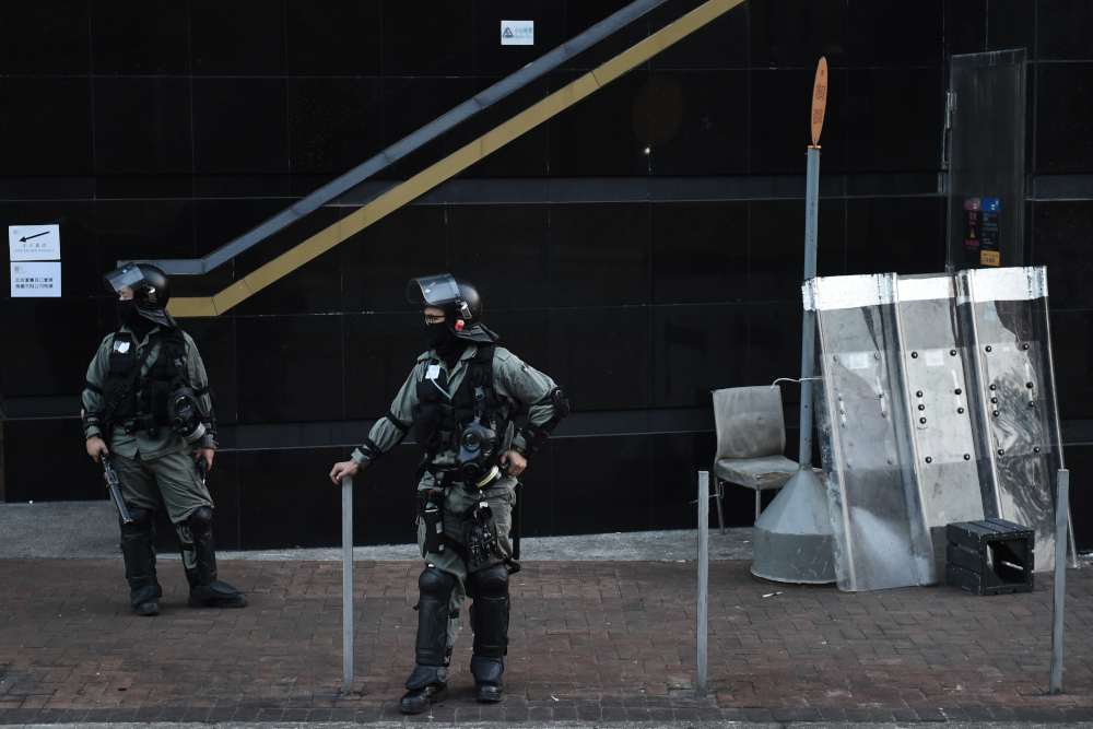 Police keep watch outside the campus of the Hong Kong Polytechnic University where dozens of pro-democracy protesters remain holed up inside, in the Hung Hom district of Hong Kong November 21, 2019. u00e2u20acu201d AFP pic 