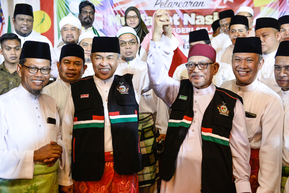 Umno President Datuk Seri Ahmad Zahid Hamidi and PAS President Datuk Seri Hadi Awang during the launch of Muafakat Nasional Selangor in Shah Alam November 23, 2019. u00e2u20acu201d Picture by Miera Zulyana
