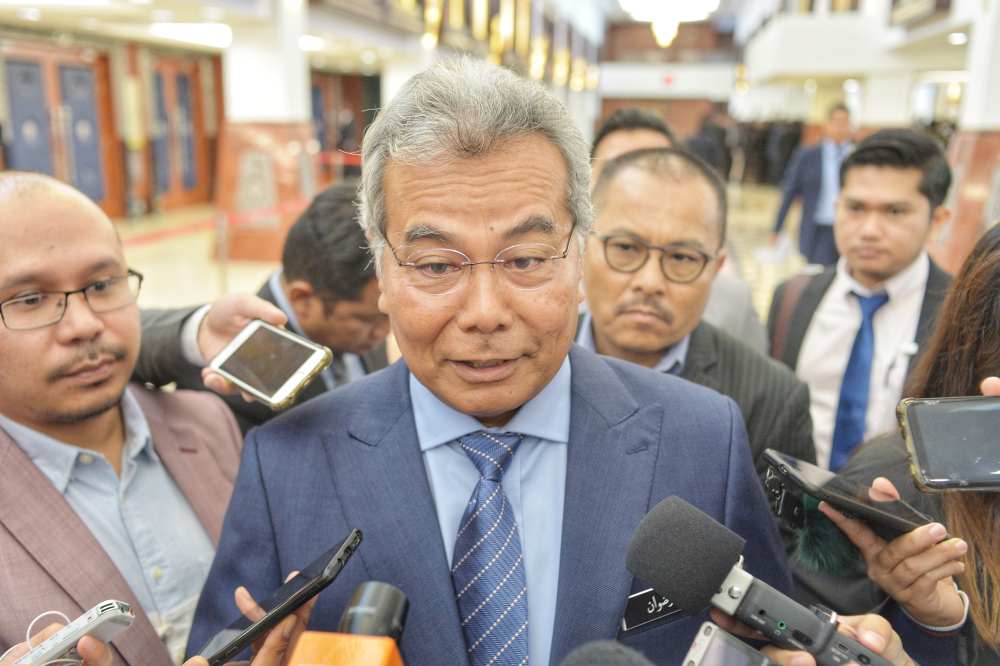 Entrepreneur Development Minister Datuk Seri Mohd Redzuan Md Yusof speaks to the media at the Parliament building in Kuala Lumpur November 20, 2019. u00e2u20acu2022 Picture by Shafwan Zaidon