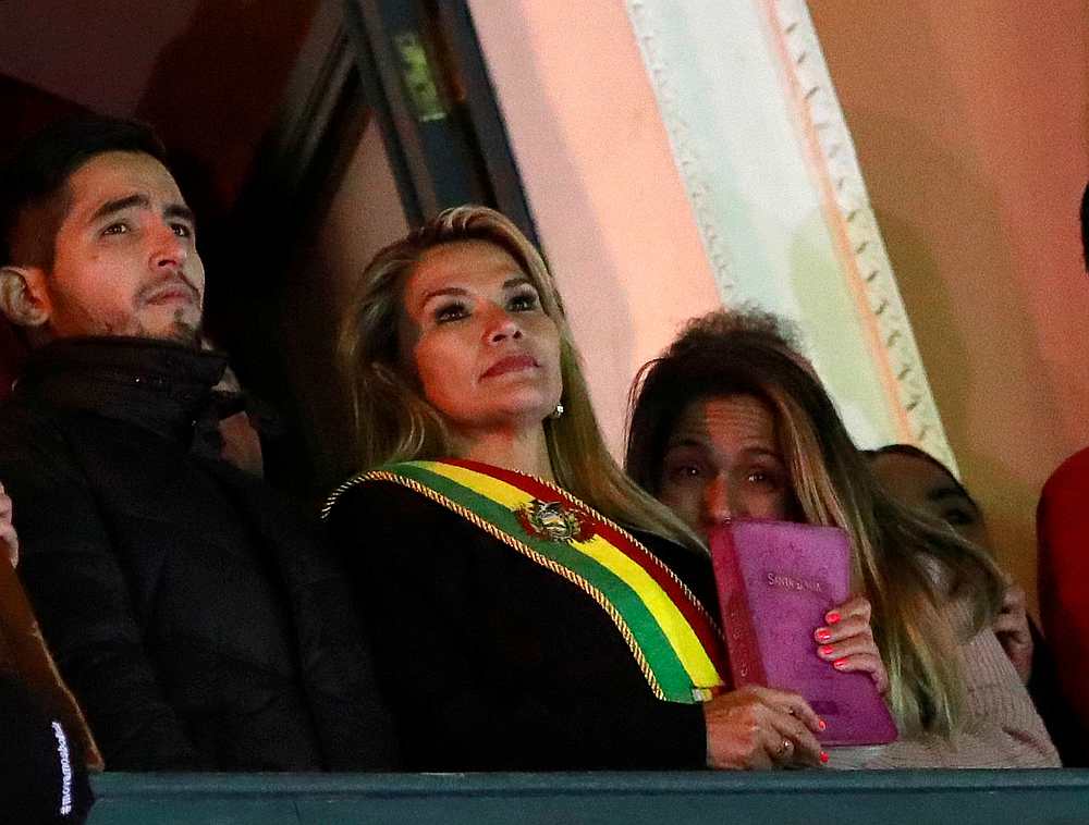 Bolivian Senator Jeanine Anez (centre) after she declared herself as interim President of Bolivia, at the balcony of the Presidential Palace, in La Paz November 12, 2019. u00e2u20acu201d Reuters pic
