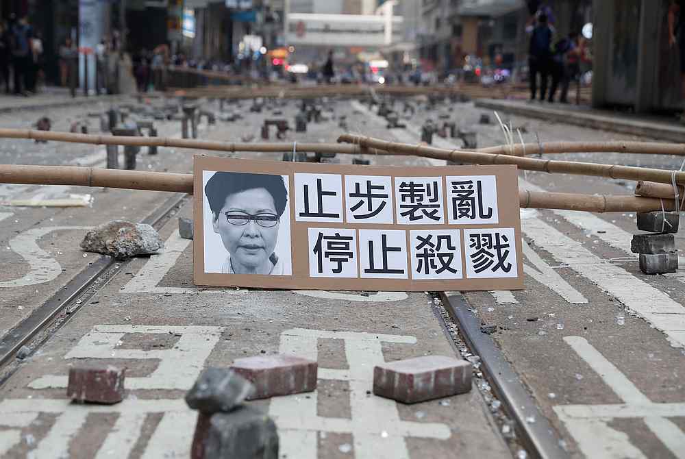 A placard with an image of Hong Kong's Chief Executive Carrie Lam is seen on a barricaded street in the Central district of Hong Kong November 13, 2019. u00e2u20acu201d Reuters pic