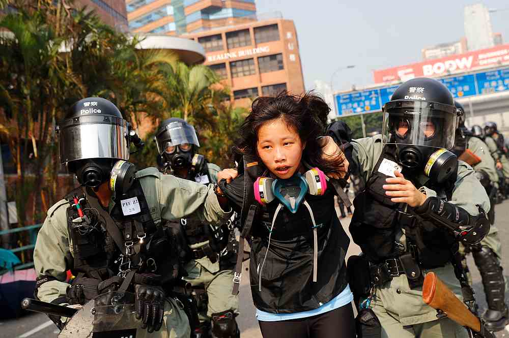 A protester is detained by riot police while attempting to leave the campus of Hong Kong Polytechnic University (PolyU) during clashes with police in Hong Kong November 18, 2019. u00e2u20acu201d Reuters pic